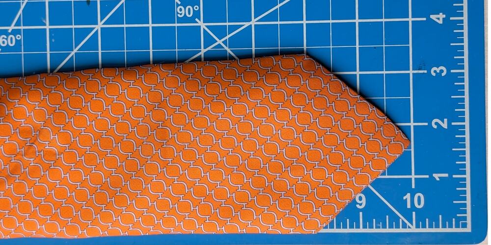 Vintage Hermès 100% Silk Men's OrangeTie With Geometric Chaine dAncre Design.